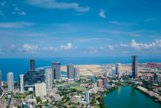 Traditional red-tiled colonial architecture and street life in the historic Fort district of Colombo, Sri Lanka - Earth Trip Personally Inspected Destinations