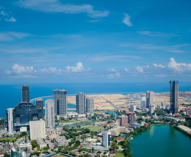 Traditional red-tiled colonial architecture and street life in the historic Fort district of Colombo, Sri Lanka - Earth Trip Personally Inspected Destinations
